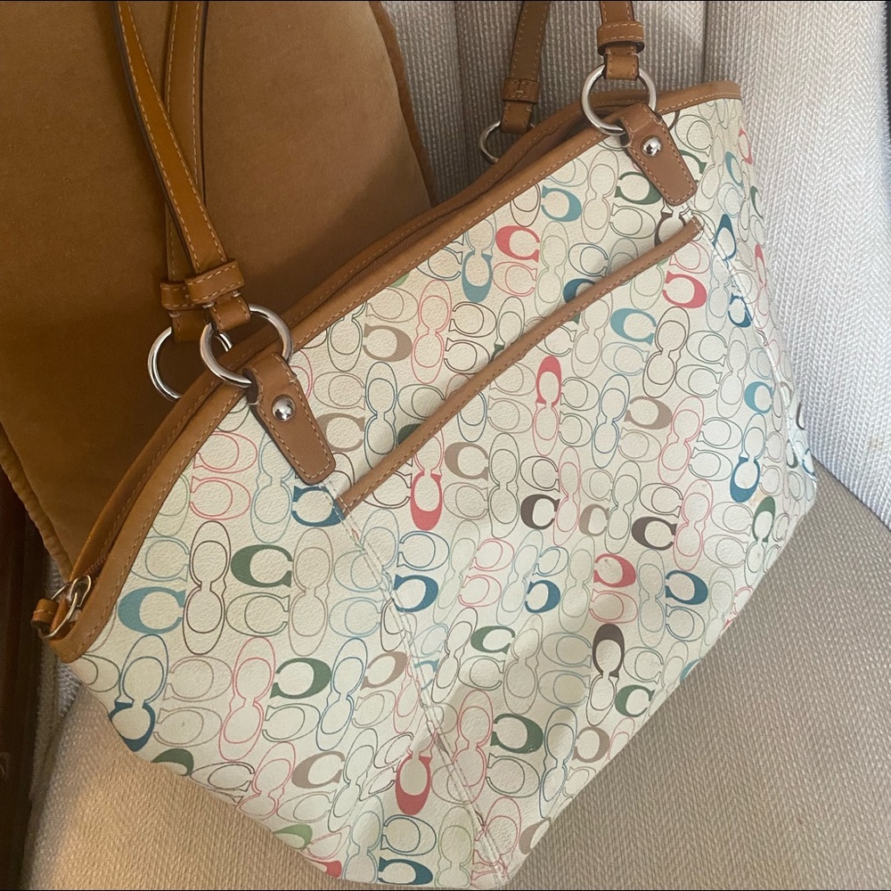 Cream colored bag with multicolored circles.